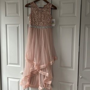 Tween blush high low party dress. Lace bodice/ beading and mesh layered bottom.